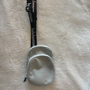 Lululemon "The Rest Is Written" Crossbody - Light Grey & Black Logo Strap